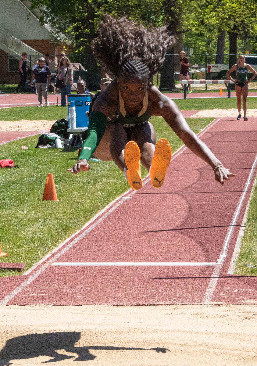 Colorado State University track and field athlete Jo-Anna Pinnock jumps into the sand in women’s long jump during CSU’s Doug Max Invitational May 2. Pinnock placed second with a 5.94 meter jump.