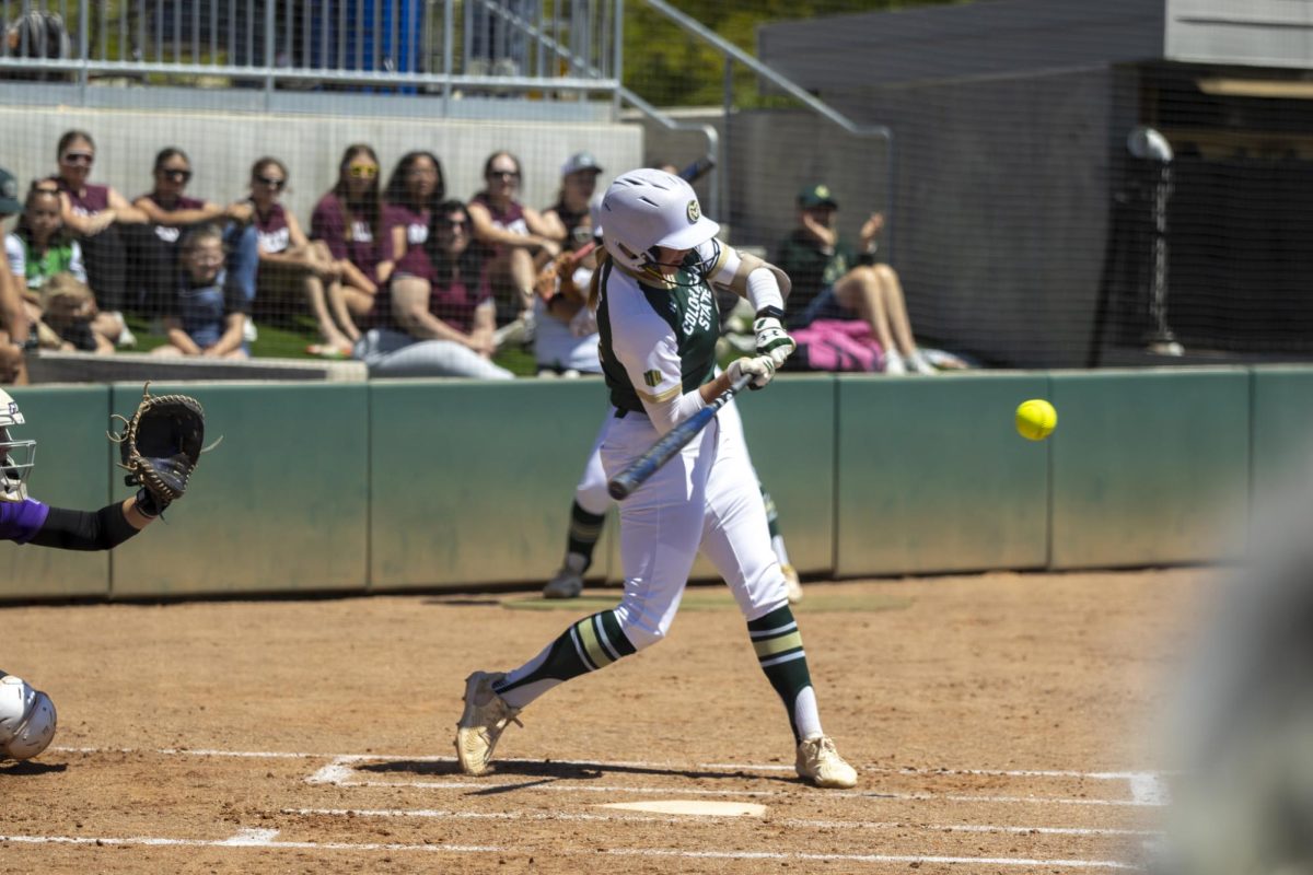 A CSU softball player hits the ball. The Rams played Grand Canyon University at the CSU softball field May 2nd.