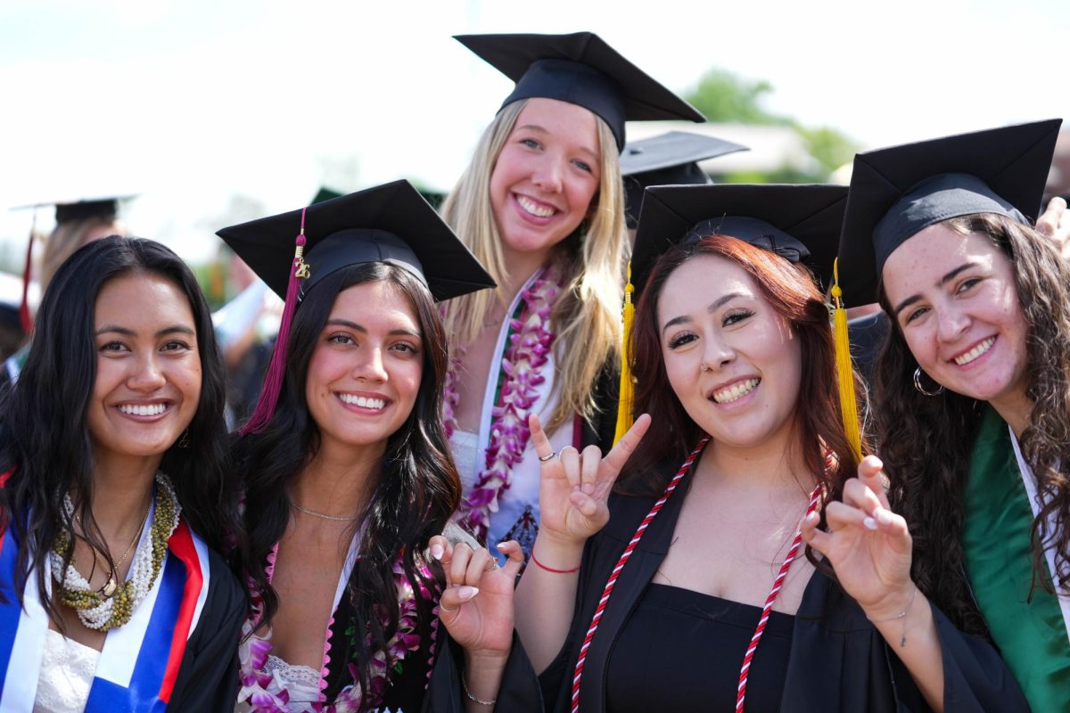 A group of Colorado State University students pose before walking into Canvas Stadium for the Universitywide Commencement ceremony May 16. This was CSU's second universitywide commencement since its transition to the format in 2025.
