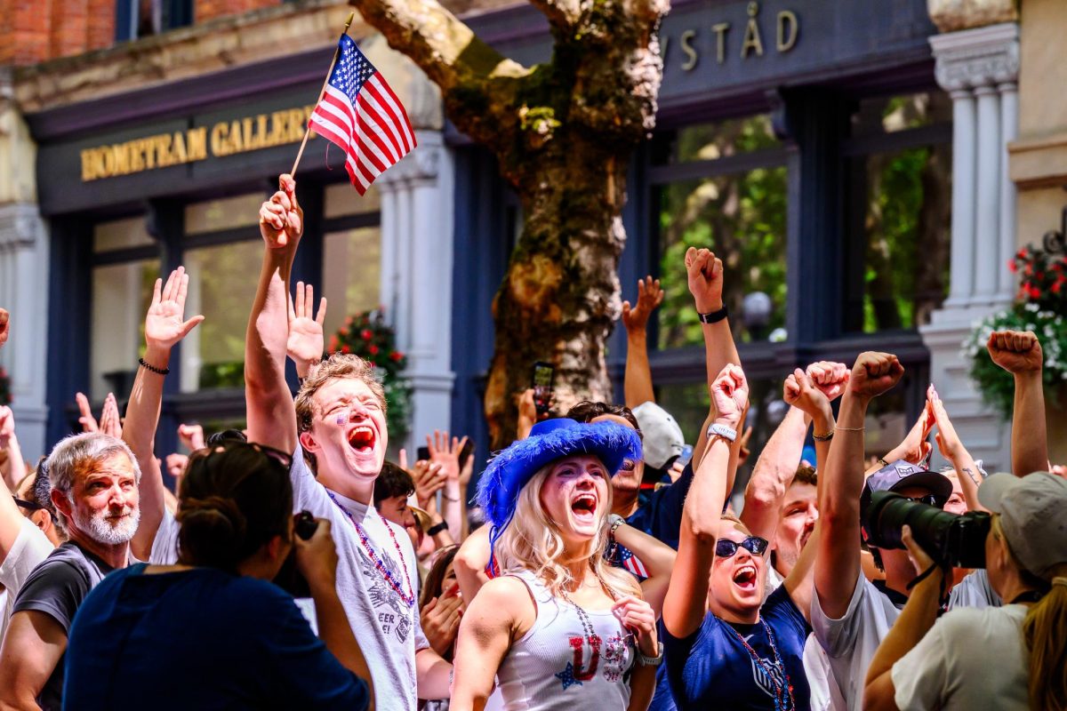 United States Men's National Tournament soccer fans cheer in Pioneer Square, Seattle, after the USMNT's game-winning goal is approved by the Video Assistant Referee June 19. Thousands of fans gathered outside  Seattle Stadium and in watch parties across the city to watch the United States play Australia and for each of the five other FIFA World Cup matches held in Seattle. 