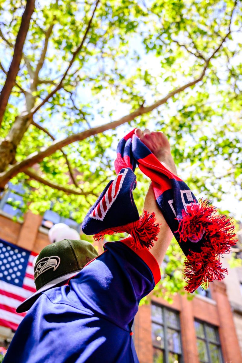 A United States Men's National Tournament fan holds up his USMNT scarf in Pioneer Square after the United States' FIFA World Cup group match win against Australia in Seattle June 19. The USMNT returned to Seattle July 6 to lose its knockout round match against Belgium, drawing a crowd estimated to be larger than the Seahawks' Super Bowl parade. 