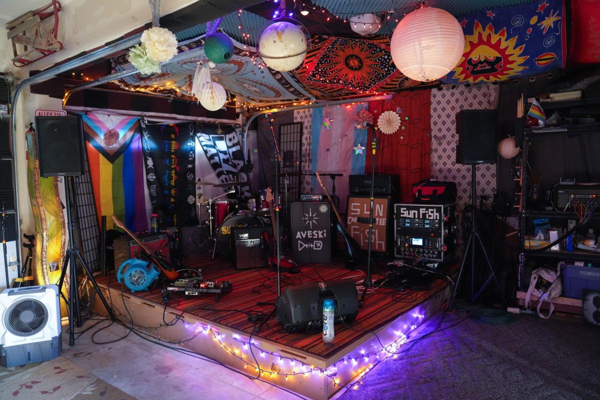 Instruments are set up on stage prior to a garage concert July 5. The Sun Spot coordinated the DIY house venue and attendees could find the address by reaching out to Sun Spot over Instagram.