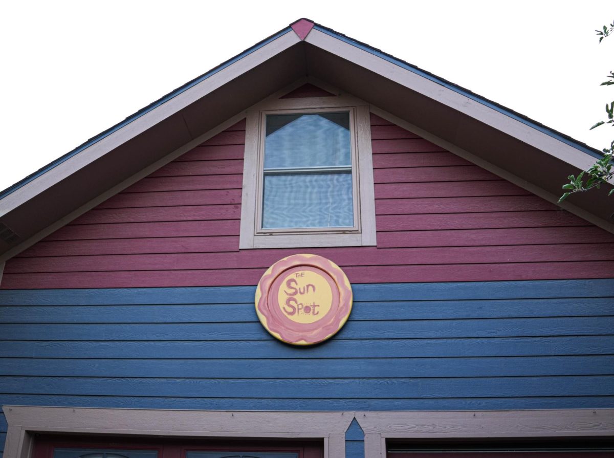 On the house for the concert is a circular plaque with 'The Sun Spot' written on to signify the venue July 5.