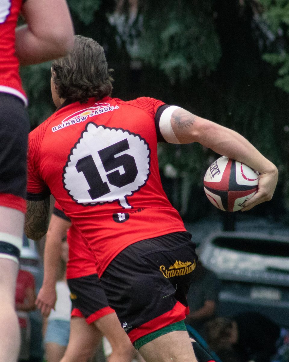 Daniel Schroder, a player for the Gentlemen of Aspen Rugby Club carries the ball in a match against Vail a rugby Club in Aspen, July 5. The gents won with a final score of 37-36. 