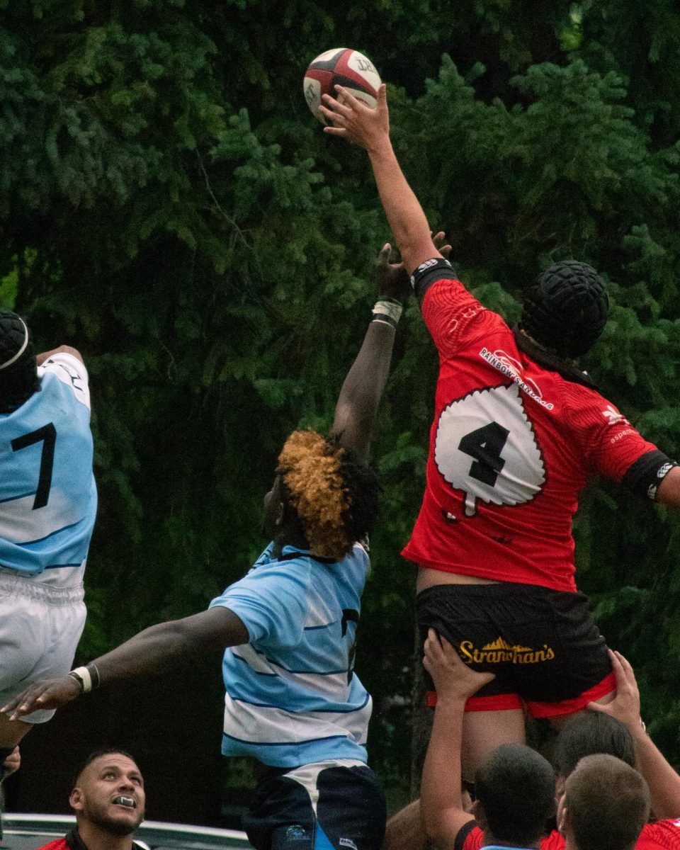 A player for the Gentlemen of Aspen Rugby Club dives over the line to score a try in a match against Vail Rugby Club, in Aspen, July 5. The gents won with a final score of 37-36. 