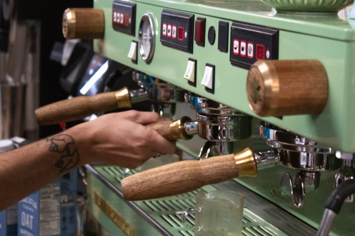 Jones Newcomb, a barista at Trickster Bakery &amp; Cafe, pulls an espresso shot for a customer at Trickster Bakery &amp; Cafe Aug. 20. “I’ve been here [Colorado] for about a year - I’m from Oklahoma originally,” Newcomb said.