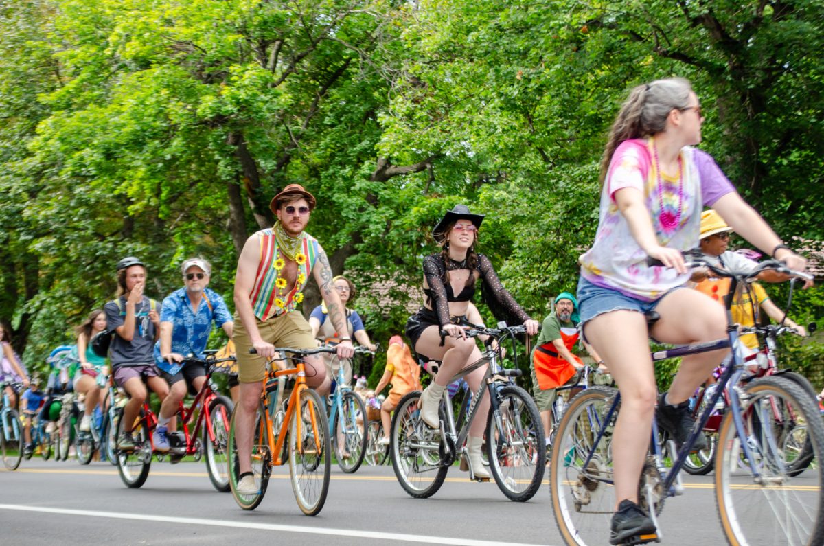Costumed cyclists pedal down Mountain Avenue at the Tour de Fat bike parade Aug. 29. Tour de Fat is an annual costumed bicycle parade hosted by New Belgium Brewing Company.