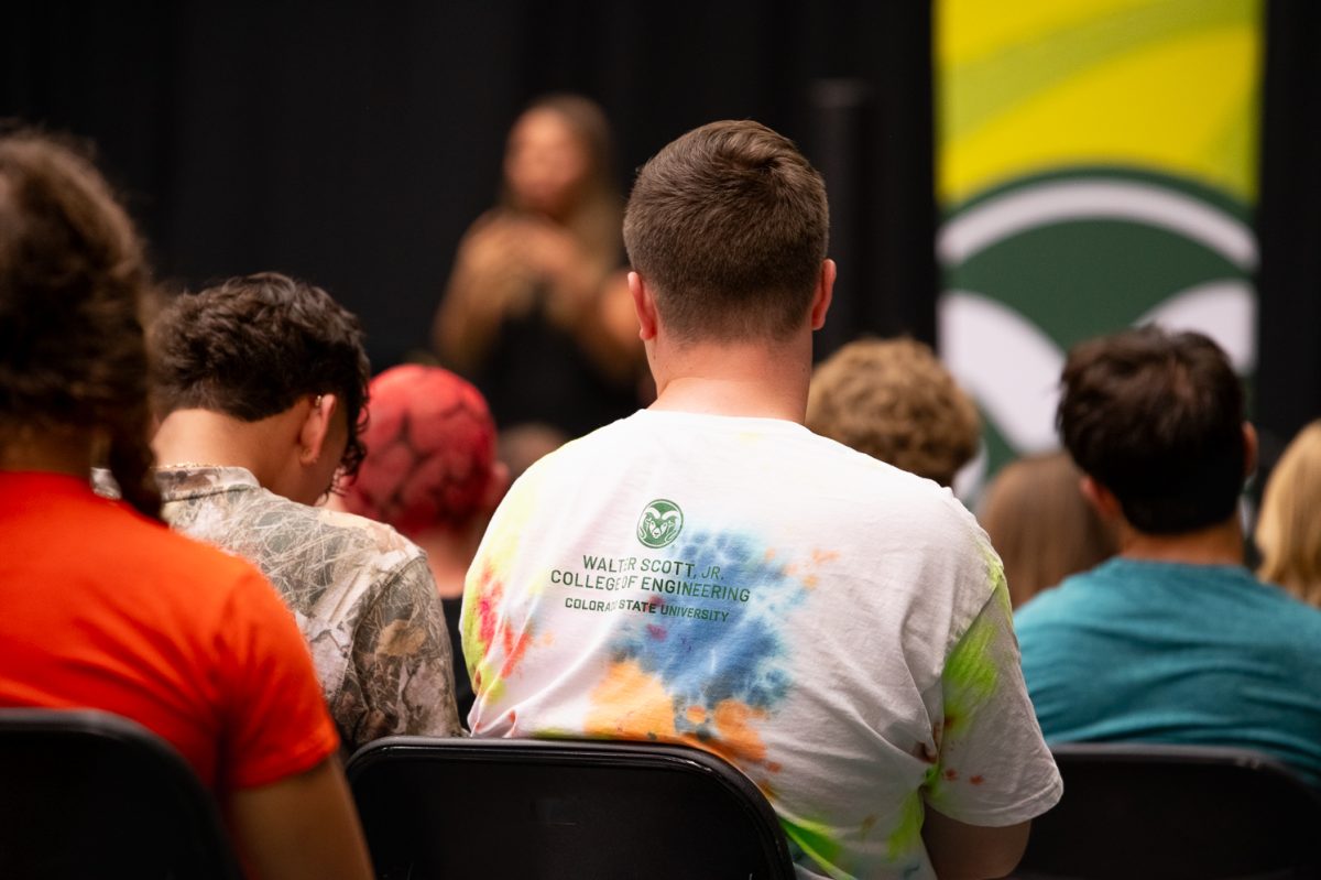 Among the crowd, student wears a shirt that reads 'Walter Scott, Jr. College of Engineering' Aug. 21.