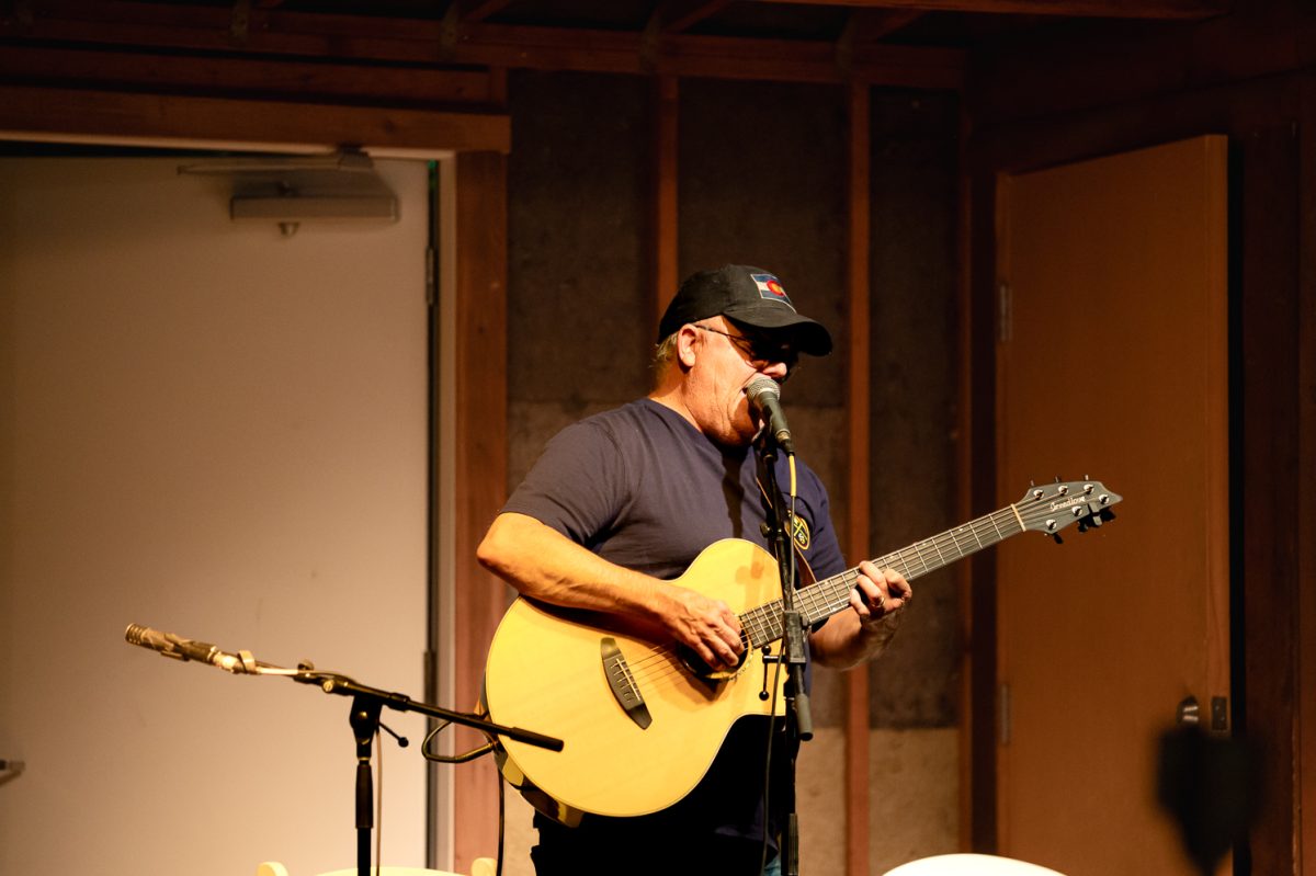 Matt Porter performs an original song, "Breakthrough" for open mic night at Avogadro's Number Sept. 1. 