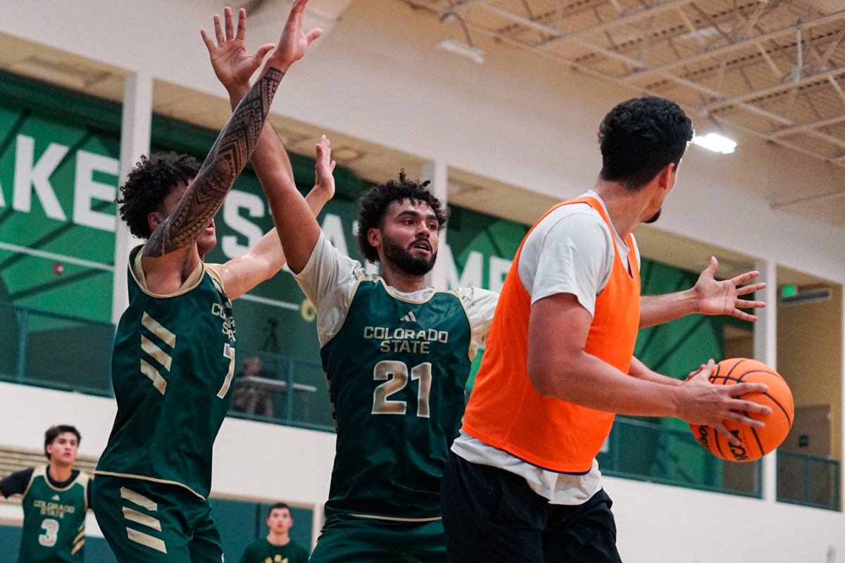 Jaden Ghoreishi (7) and Rashaan Mbemba (21) guard an opponent as part of a defense drill during a practice in Colorado State University's indoor practice facility Sept. 24.