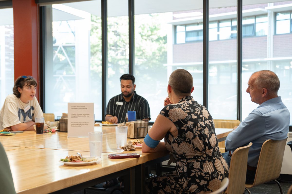 Staff and students gather a meal during the food for thought Multifaith & Belief Initiative at the Foundry Sept. 3. 