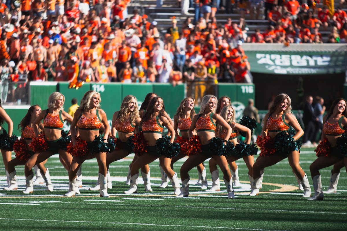The Colorado State University Golden Poms dance before kickoff at the Ag Day football game against Southern Utah University Sept. 12. 