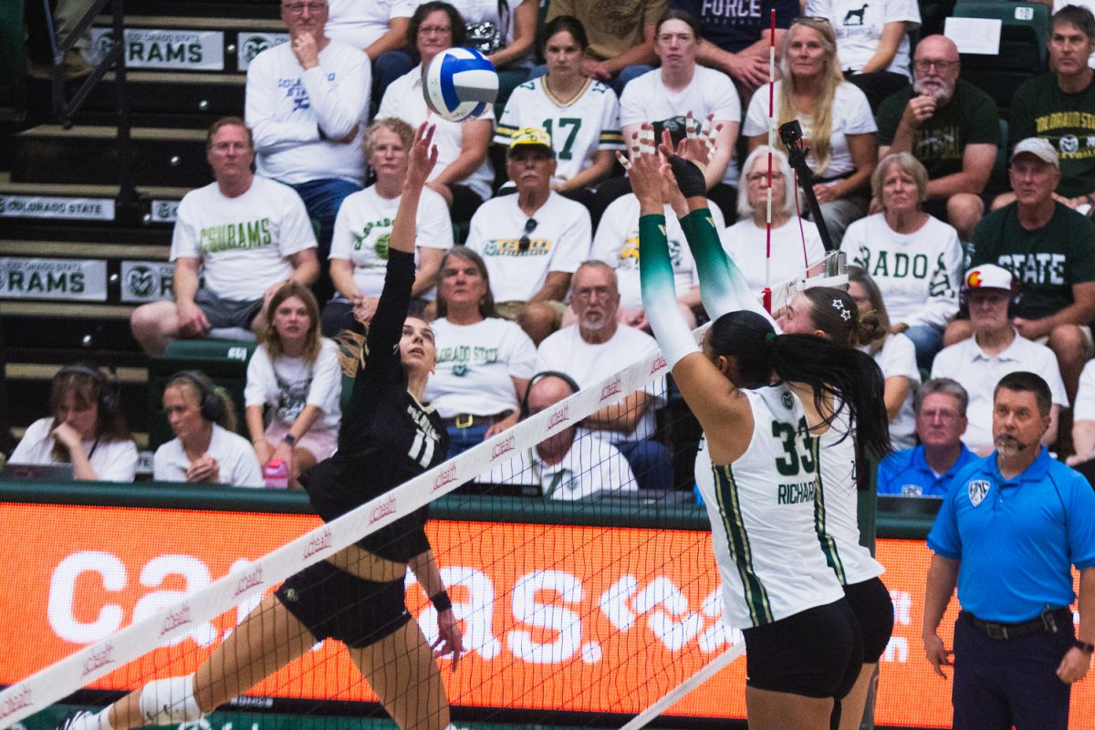 Kekua Richards (33) and Sofia Zabjeck (5) jump to block an attack from a University of Colorado, Boulder volleyball player in Moby Arena Sept. 18. Together, Richards and Zabjeck accrued eight blocks against the Buffaloes, ensuring that the Rams finished all three sets ahead, winning the golden spike.
