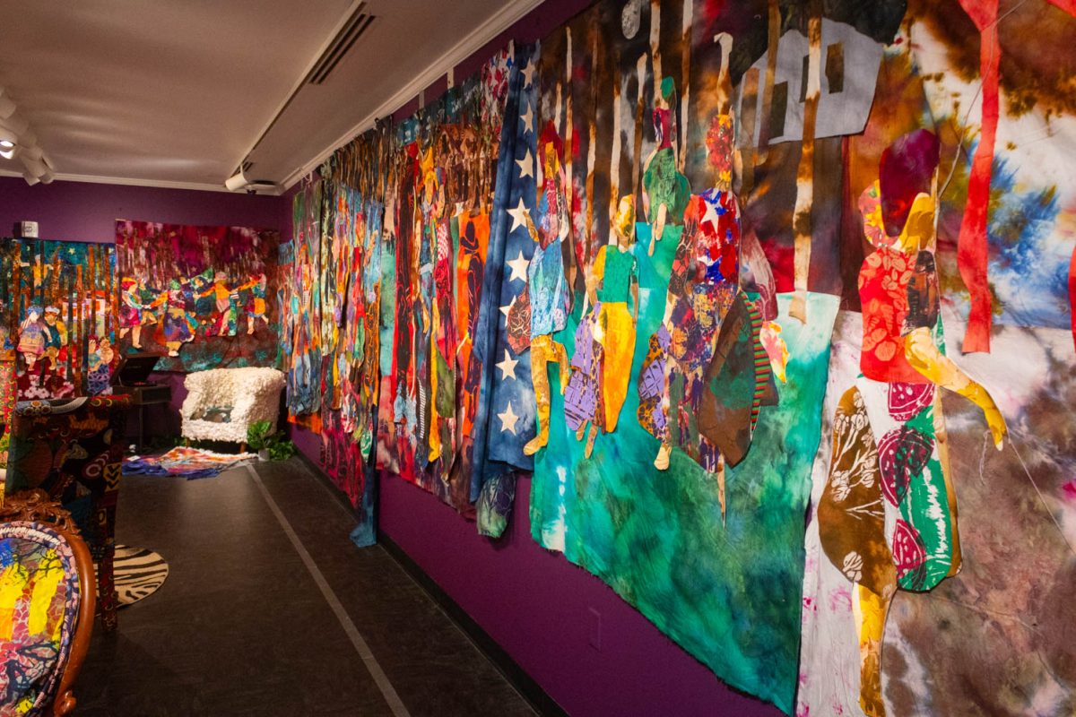 Various colorful fabrics placed on the whole wall,