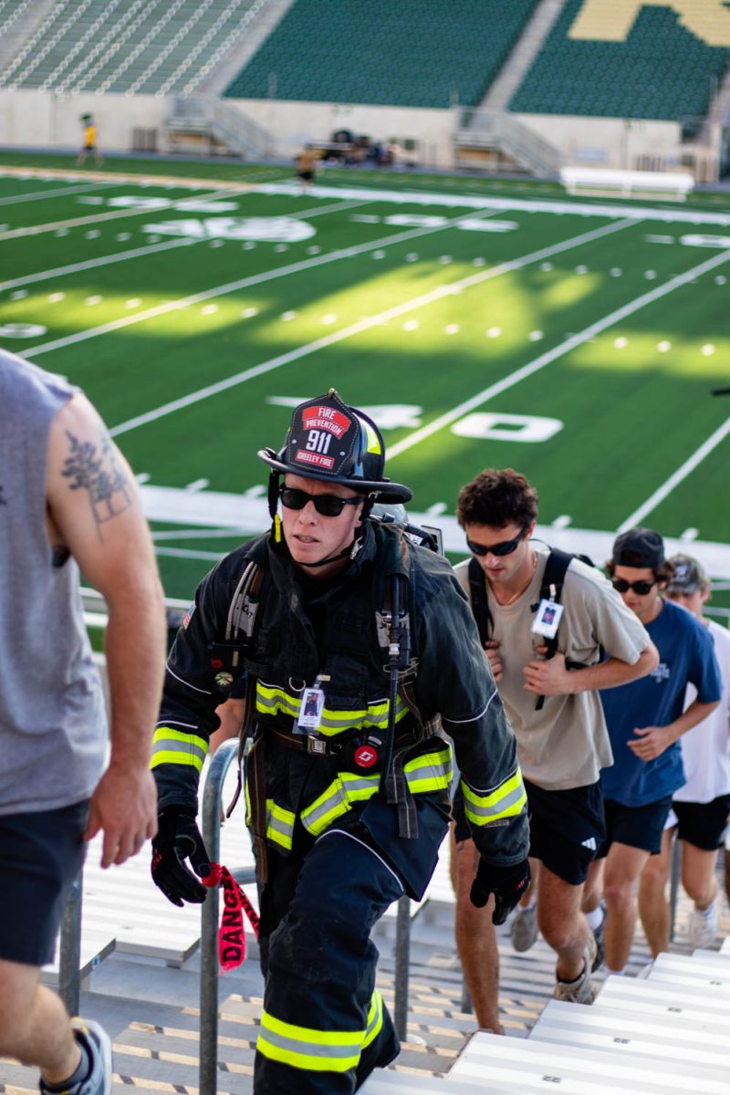 Firefighters and community members ascend the steps of Canvas Stadium at the Northern Colorado 9/11 Memorial & Stair Climb Sept. 11.