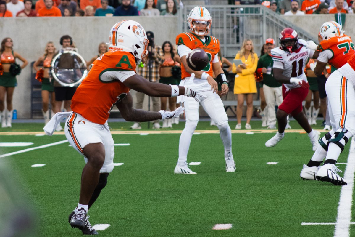 Colorado State University running back Mel Brown (1) lines up to catch a pass from quarterback Hauss Hejny (8) during the first quarter of CSU's game against Southern Utah University Sept. 12. Hejny put up 325 passing yards for the Rams, leading CSU to their 58-24 win against SUU.
