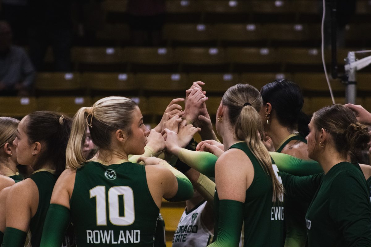 The Colorado State University volleyball team huddles up after their matchup against the University of Colorado, Boulder in the CU Events Arena Sept. 17. The Rams lost the first game of the double-header 3-1, in their competition for the golden spike. 