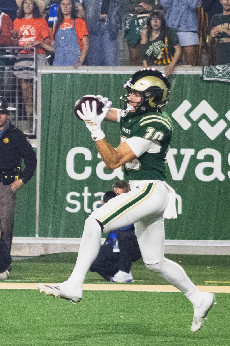 Colorado State University wide receiver Tommy Maher (10) catches a throw from quarterback Darius Curry (3) for the Rams during their game against Brigham Young University Sept. 19. CSU lost the game 41-23.