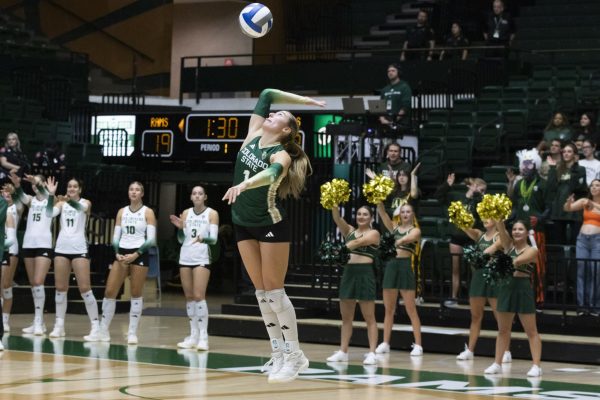 Karsyn Fetzer (1) serves the ball during Colorado State University volleyball's match against San Diego State University in Moby Arena Sept. 24.