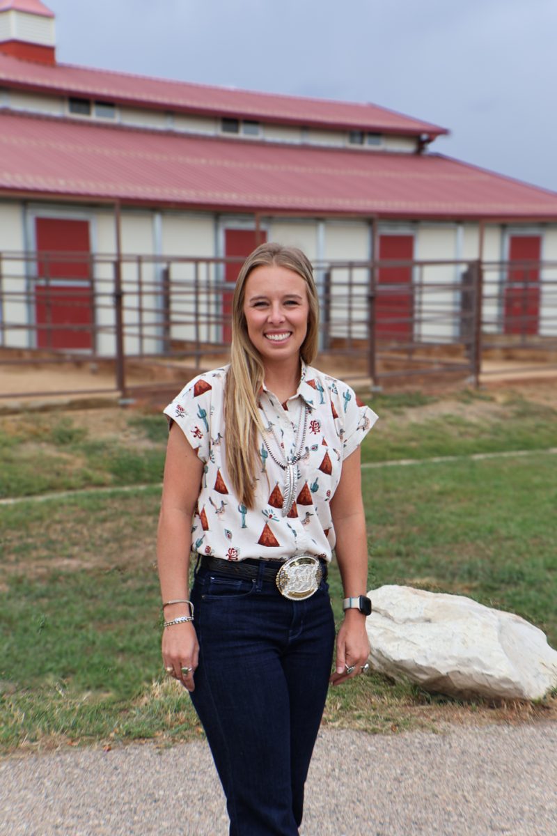 Maggie Murphy, Ph.D., in front of one of the equine reproduction center barns, Sept. 23