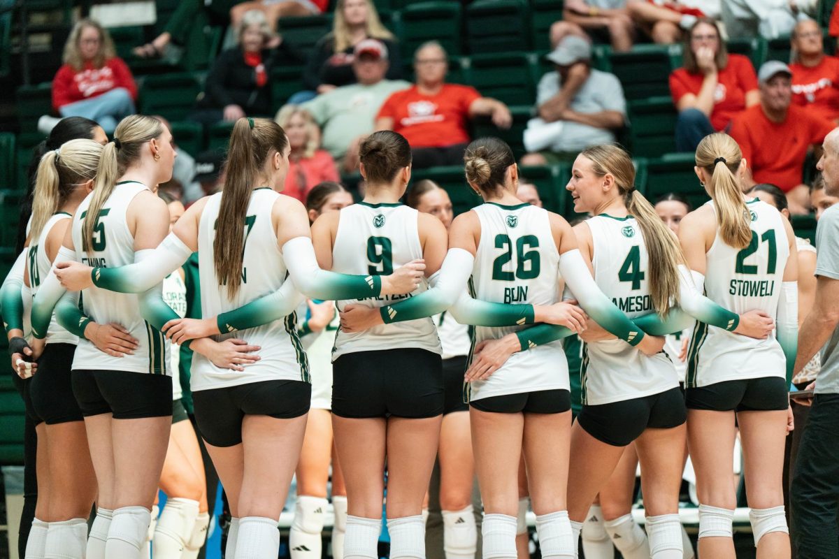 Colorado State University's volleyball team gathers around during the last timeout during their final set against the University of South Dakota Sept. 10. Colorado State won 3-0.