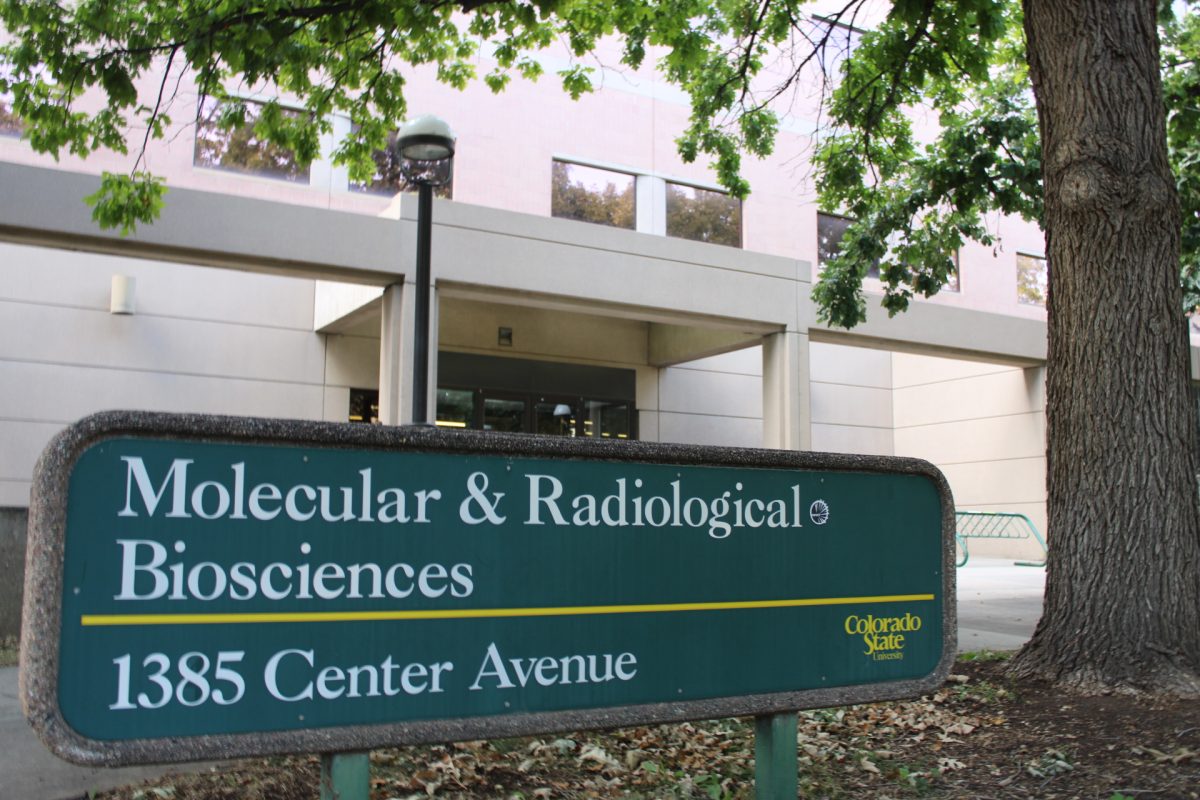 The sign in front of the Molecular & Radiological Biosciences Building is shaded by a tree Sept. 20.