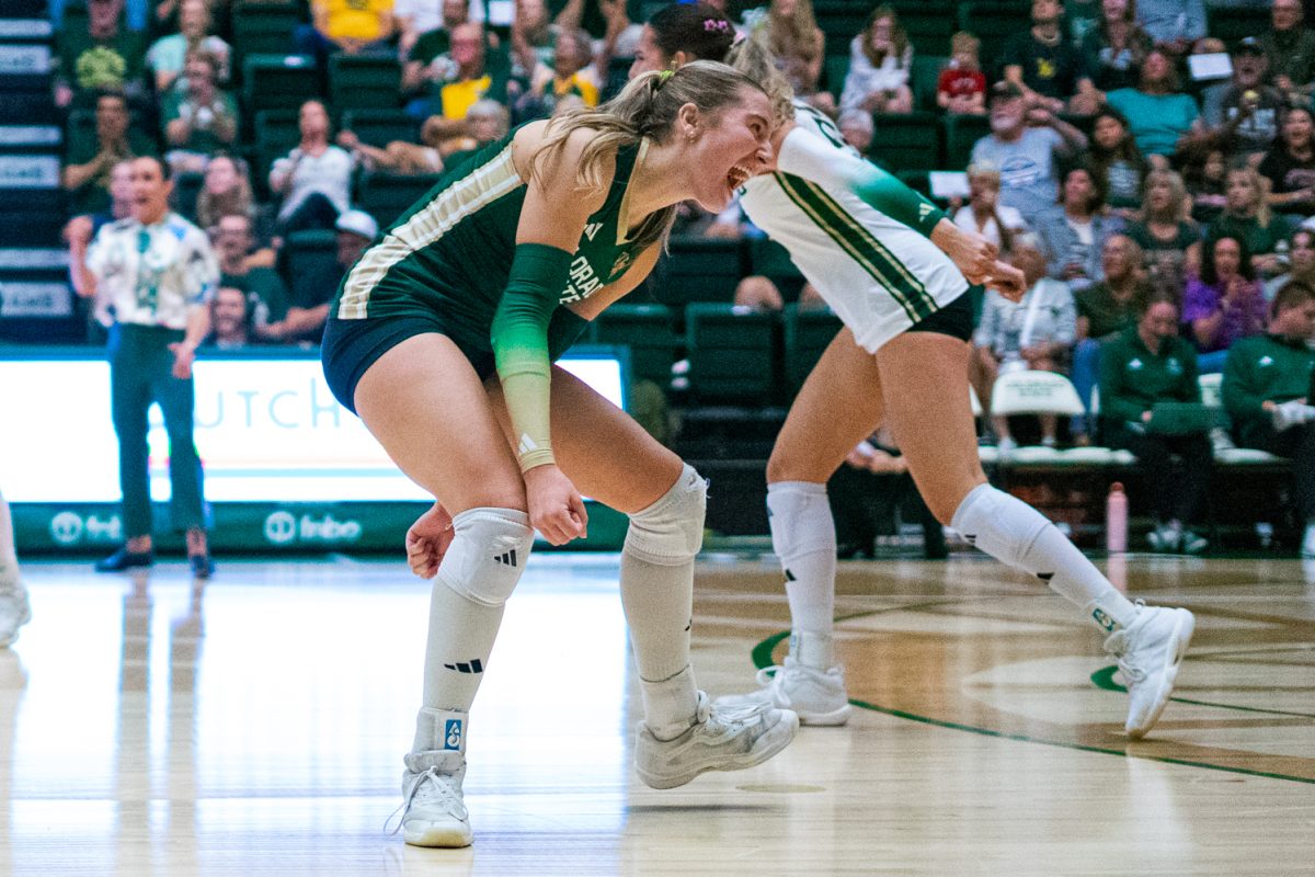 Karsyn Fetzer (1), a libero on the Colorado State University volleyball team celebrates a point against Oregon State University after another CSU player scores on a successful block in Moby Arena Oct. 10. Fetzer assisted the Rams in scoring 5 times over  the game's four sets which ended in a 3-1 win for CSU.