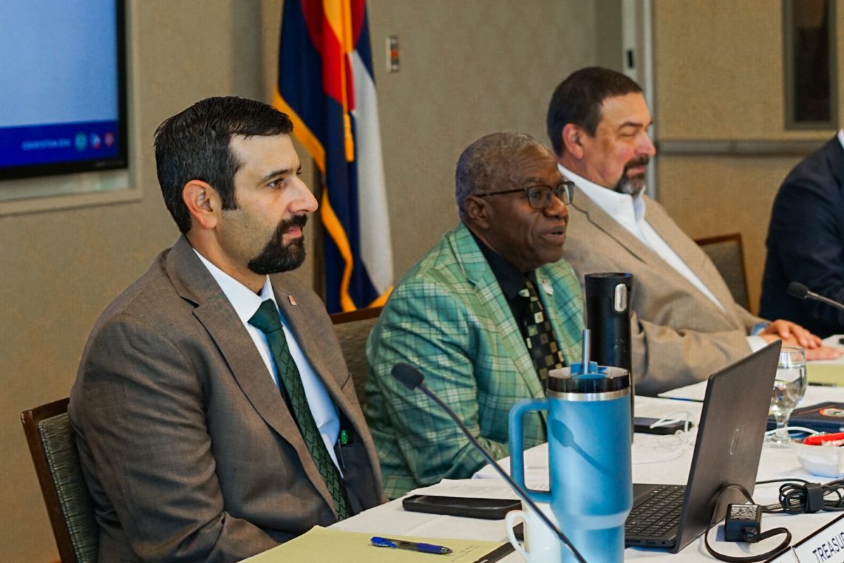 Dominic Disanti, Treasurer on the Colorado State University Board of Governors, listens as Dr. Nathaniel Easley Jr., the Chair of the board, makes an opening statement during a board meeting in the Lory Student Center Oct. 1.