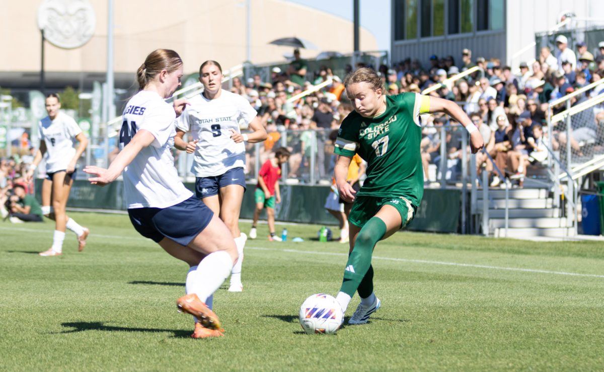 Colorado State University Senior Bridget Arnold (17) dribbles the ball toward the Utah State University defense during their game at the CSU Soccer Field Oct 4. CSU lost the game 3-0.