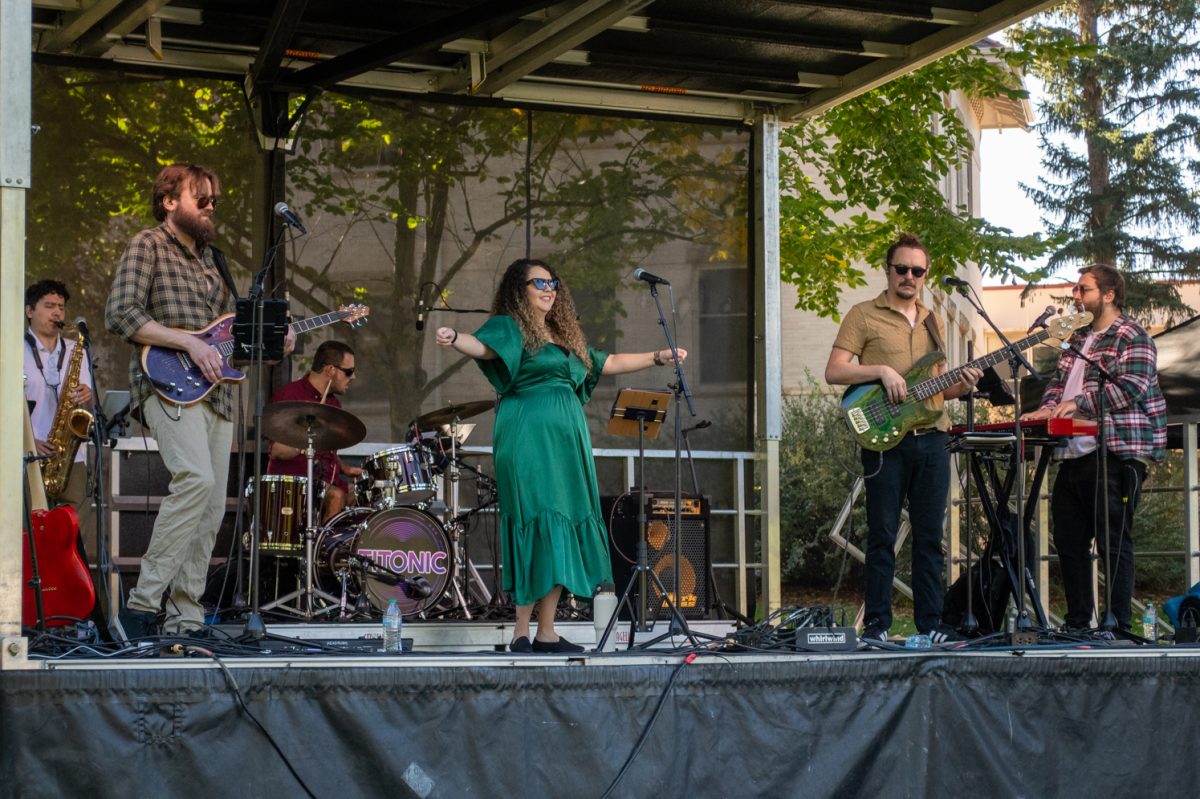 Titonic, an eight-piece funk, soul and R&B band, plays live music at Festival on the Oval Oct. 2