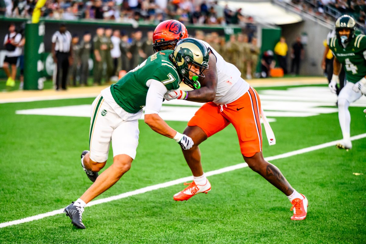 Colorado State University cornerback Jordan Lessard (7) struggles against an Oregon State University offensive player during CSU's game against OSU Oct. 3.