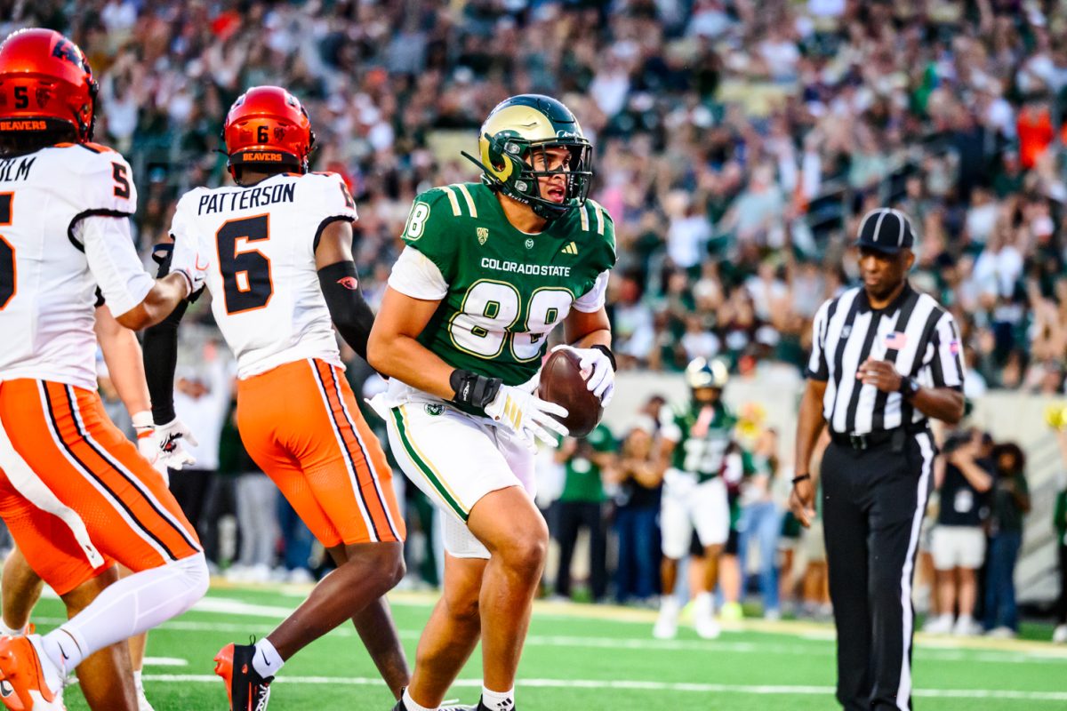 Colorado State University tight end Nader Chirchi (88) carries the ball into the endzone for a touchdown during CSU's game against Oregon State University Oct. 3.