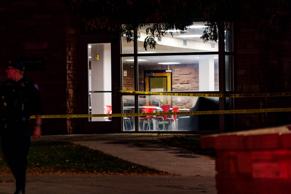 Police barricade tape blocks off the Colorado State University Microbiology Building after an officer involved shooting Oct. 12. 