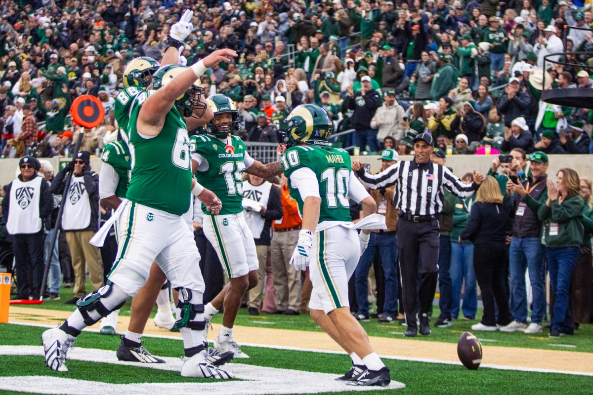Tommy Maher (10) celebrates a touchdown in the first quarter of Colorado State University's game against San Diego State University in Canvas Stadium Oct. 24. Maher caught a 9-yard pass from quarterback Hauss Hejny (8) at the SDSU 12 yard line before running it to the end zone.