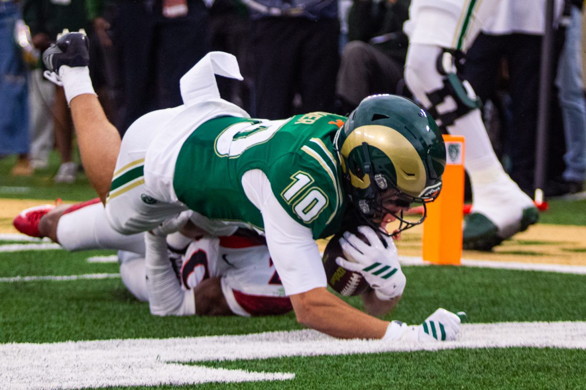 Tommy Maher (10), a Colorado State University wide receiver, touches the ground in the endzone to score a touchdown for the Rams during their game against San Diego State University in Canvas Stadium Oct. 24. Maher led the Rams with 102 receiving yards, and a longest reception of 54 yards.